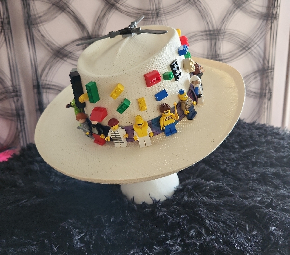 Unique Cream Hat with Colorful Toy Accents